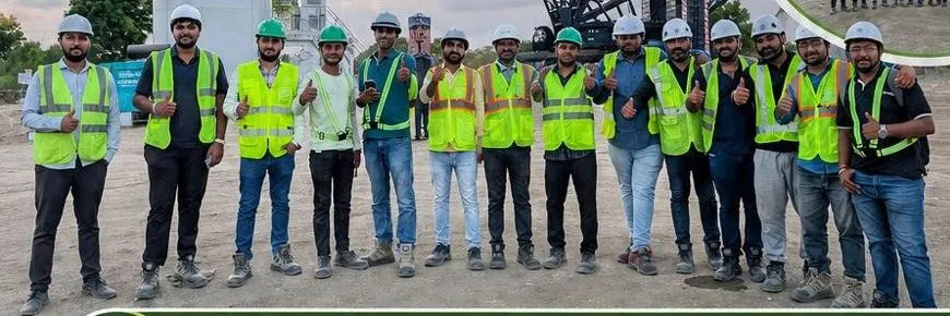 Greentech site team celebrating the first turbine installation